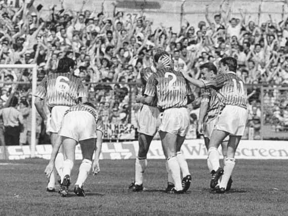 Tim Breacker celebrates his stunner at Derby County
