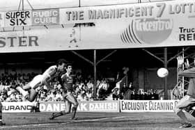 David Moss flies through the air to score for the Hatters during his time at Kenilworth Road