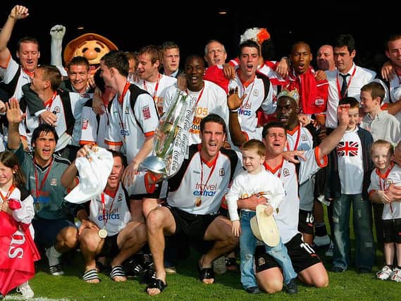 Chris Coyne celebrates winning the League One title back in 2005