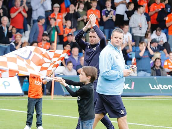 Luton boss Nathan Jones applauds the Town fans during his first spell in charge