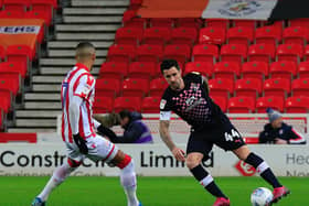 Former Town defender Alan Sheehan in action against Stoke City this season