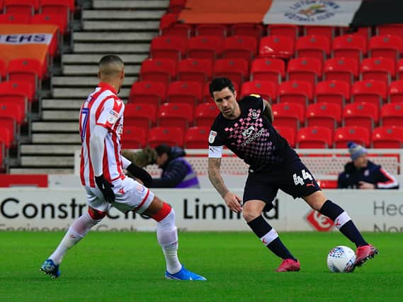 Former Town defender Alan Sheehan in action against Stoke City this season