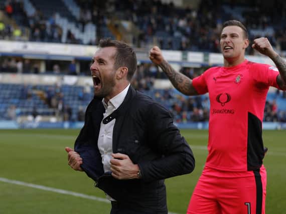 Hatters boss Nathan Jones celebrates a win at Wycombe during his first spell in charge of the club