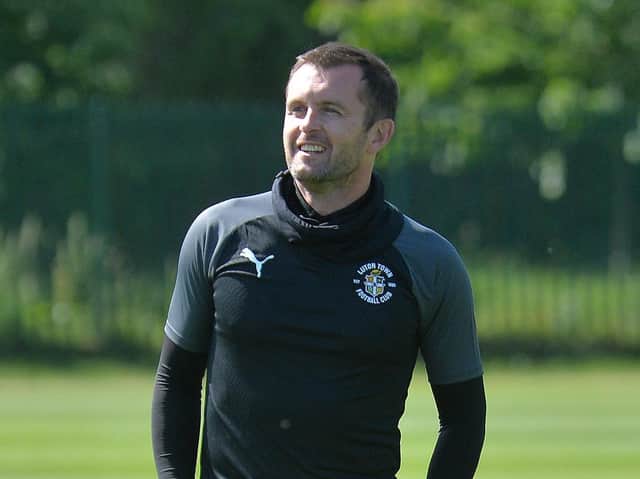 Hatters boss Nathan Jones takes training at the Brache once more