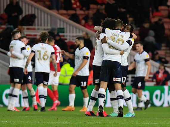 Luton's players celebrate a victory at Middlesbrough back in February