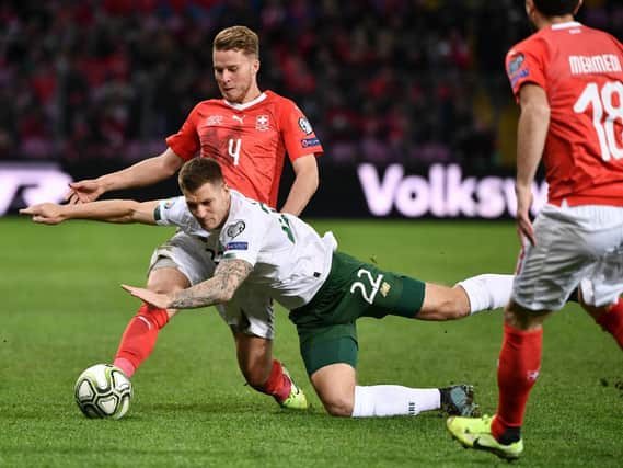 Town striker James Collins in action for Ireland