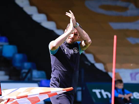 Town chief Nathan Jones applauds the Luton fans during his first spell in charge