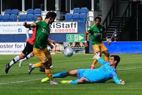 Simon Sluga makes a crucial save from Sean Maguire as Town's game with Preston finished 1-1