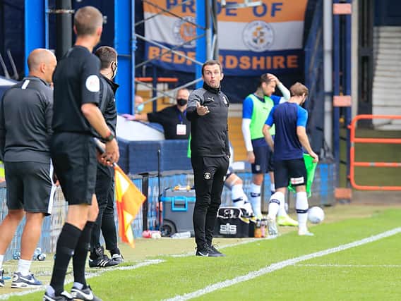 Hatters boss Nathan Jones was back in the dugout for Luton this afternoon