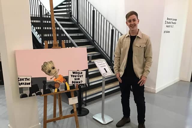 Political painter Nathan Lee with two pieces on deforestation