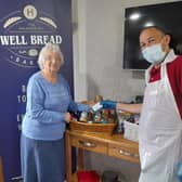 Joan Loxton and Jerome Stafford with the food donations