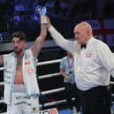 Jordan Reynolds has his arm raised after victory at York Hall on Saturday - pic: MTK Global