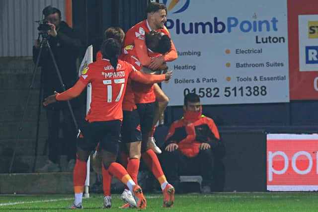 Harry Cornick is congratulated after making it 3-1 to Luton