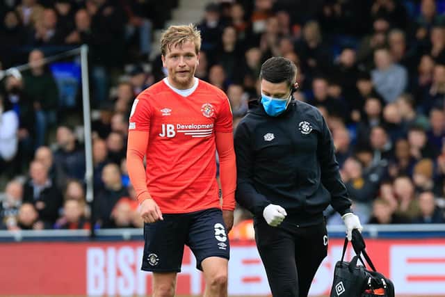 Luke Berry comes off injured against Hull recently