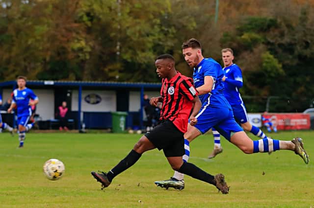 Dunstable Town's Terence Muchineripi scores the third goal on Saturday - pic: Liam Smith