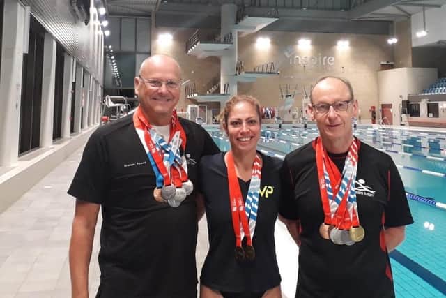 Medal winners: Graham Powell, Jo Mitchinson and Dave Wright
