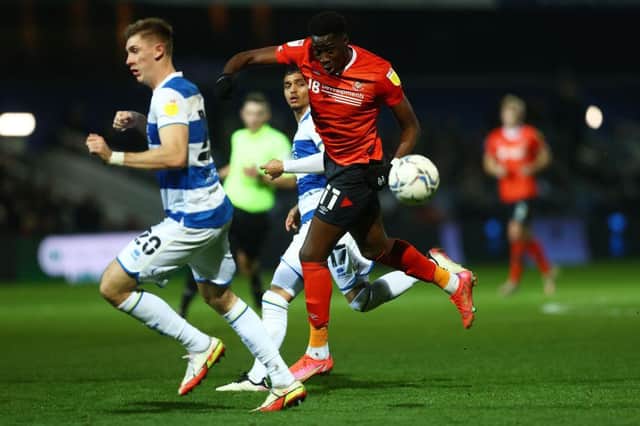 Town striker Elijah Adebayo looks to win the ball against QPR on Friday night