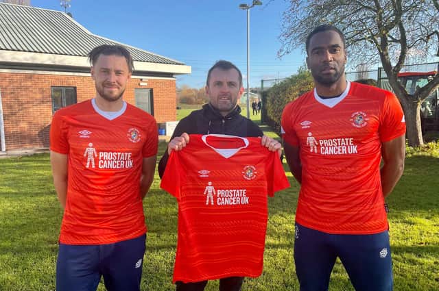 Harry Cornick, Nathan Jones and Cameron Jerome with the Luton shirts they will wear against Cardiff on Saturday - pic: Gareth Owen