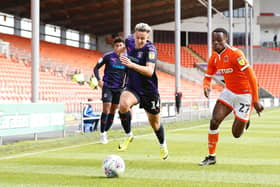 Harry Cornick looks to get away during Luton's last trip to Blackpool in 2018