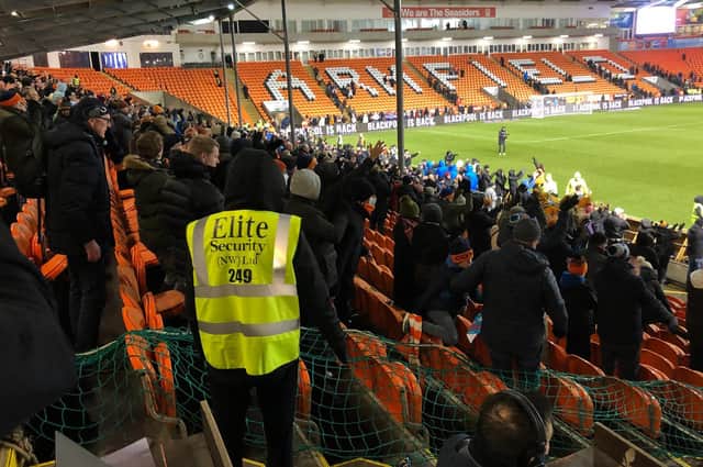 Town fans celebrate the 3-0 win at Blackpool on Saturday