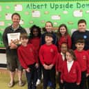 Ian with pupils at Bramingham Primary school