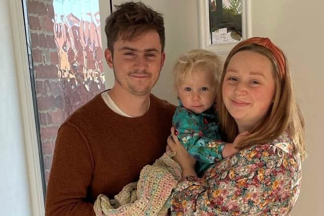 Eloise and Ian with their daughter