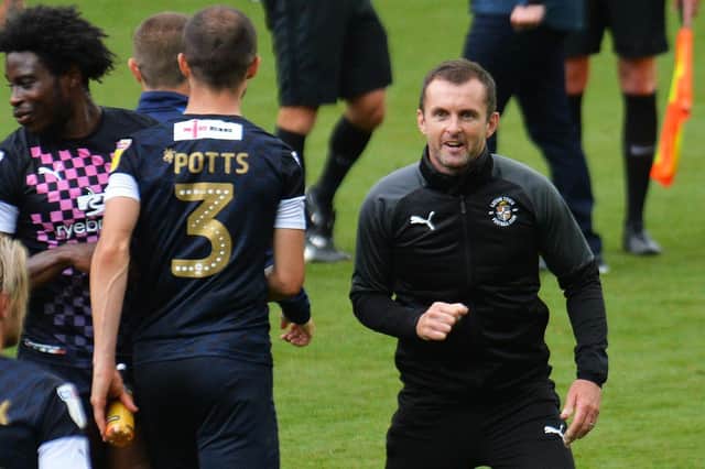 Nathan Jones celebrates Town's 1-0 win over Swansea back in July 2020