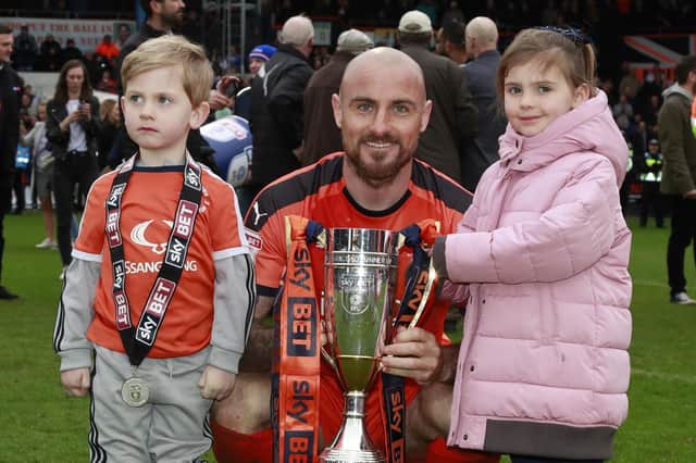 Alan McCormack celebrates winning promotion with the Hatters during his time at Kenilworth Road