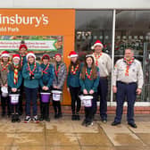 Fundraising for the Jamboree with Nick (left) dressed as an elf.