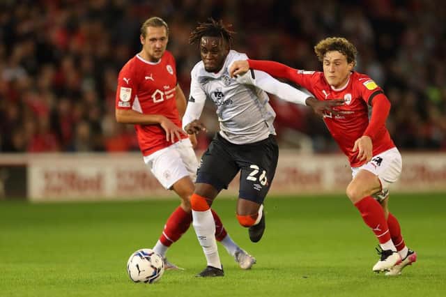 Admiral Muskwe looks to break away during one of his starts for the Hatters at Barnsley earlier in the season