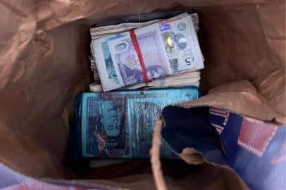 5kg of Class A drugs and around £100,000 in cash has been seized