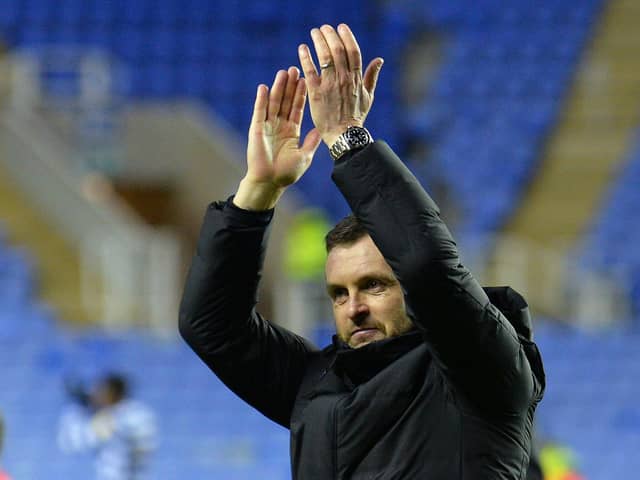 Town boss Nathan Jones applauds the Luton fans at Reading this evening - pic: Gareth Owen