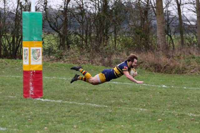 Nick Potgieter goes over for his first try
