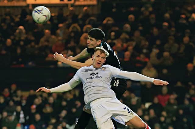 James Bree goes up for a header against Bristol City last night