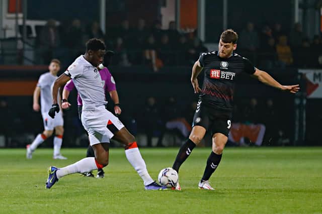 Elijah Adebayo gets stuck in against Bristol City on Tuesday night