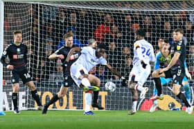 Elijah Adebayo goes for goal against Bristol City