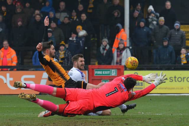 James Collins puts Luton ahead on their last visit to Cambridge in March 2018