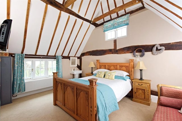 The house has four to five bedrooms, including a spectacular guest bedroom with vaulted ceiling and the master suite with its dressing room (which could be used as the fifth bedroom)