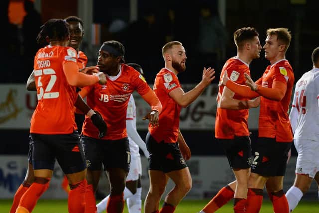 Luton's players celebrate their opening goal against Barnsley - pic: Gareth Owen