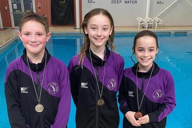 Luton Diving Club members with their medals