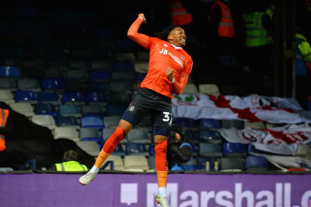 Gabe Osho celebrates Luton's first goal on Tuesday night that was awarded to team-mate Allan Campbell - pic: Gareth Owen