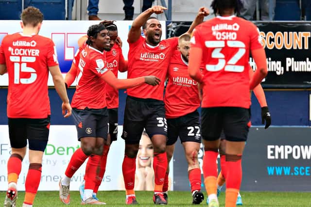 Town striker Cameron Jerome celebrates his first league goal for Luton