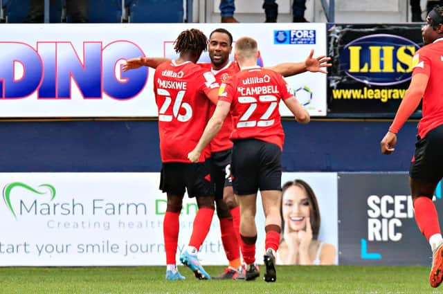 Cameron Jerome celebrates his first goal in the Championship for Luton