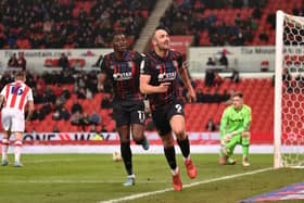 Danny Hylton celebrates opening the scoring against Stoke on Wednesday night