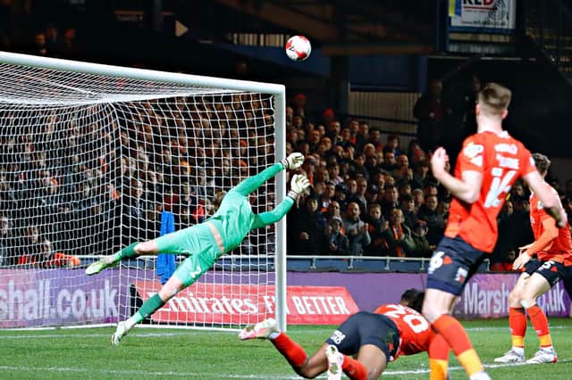 Luton keeper Harry Isted makes another terrific save against Chelsea last night