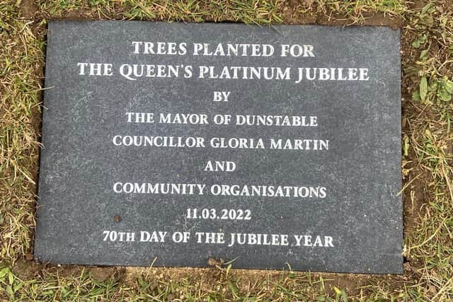 A plaque to mark the planting