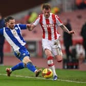 Glen Rea slides in during his debut for Wigan Athletic in the FA Cup defeat to Stoke