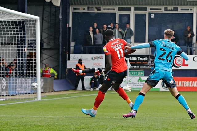 Elijah Adebayo sees his shot hit the net to make it 1-1 against Millwall this afternoon