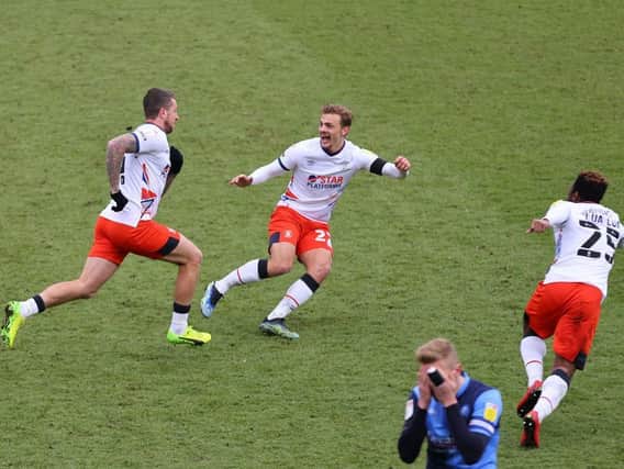 George Moncur wheels away after scoring the leveller against Wycombe on Saturday