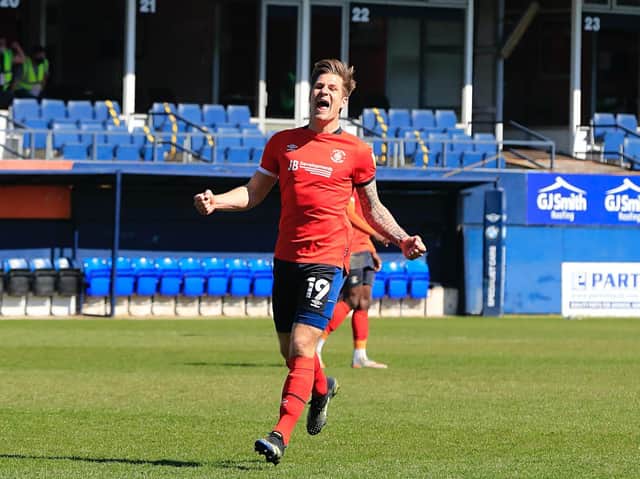 James Collins celebrates Luton's 1-0 win over Watford